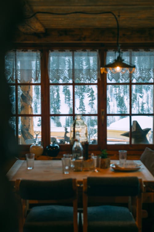 Cozy room with served table near window