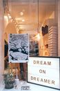 Glass shop window with signboard