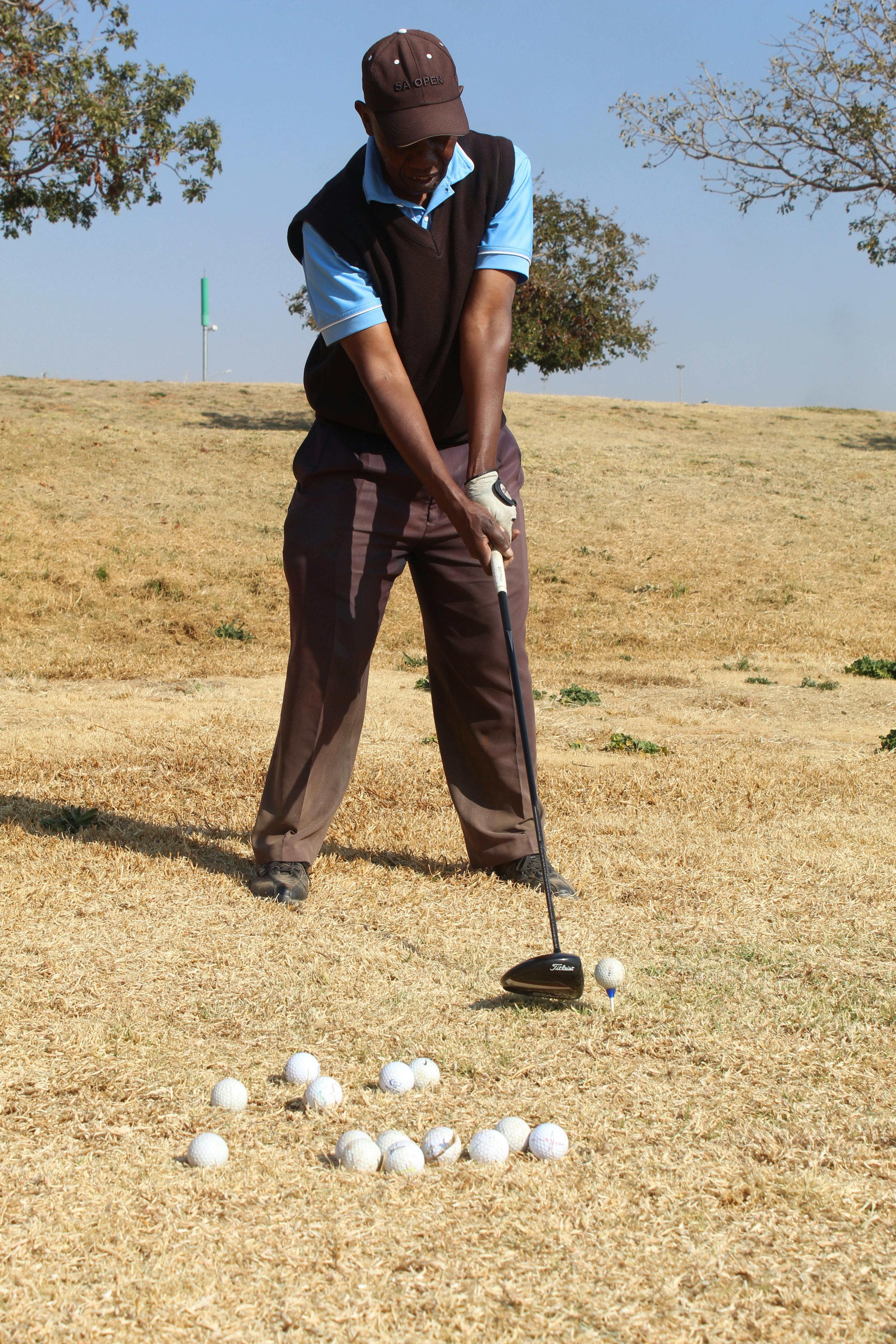 a golfer in driving range