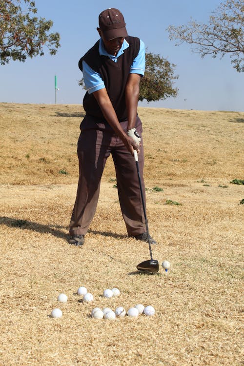 A Golfer in Driving Range 