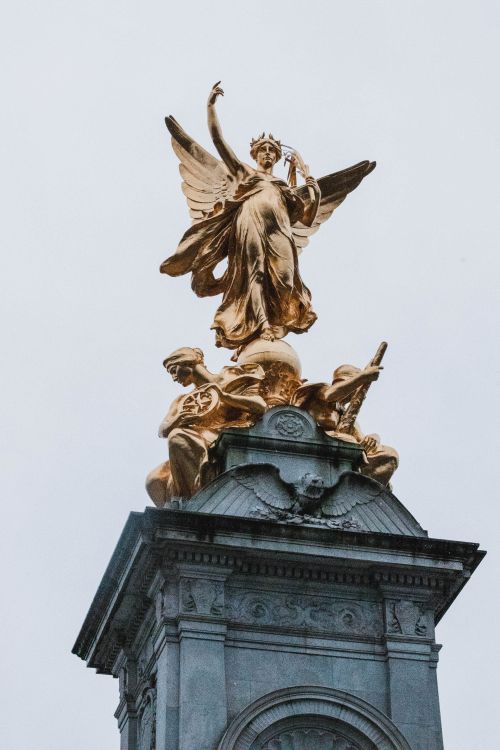 Free Close-up of the golden statue atop the iconic Victoria Memorial in London, England. Stock Photo