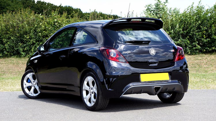 Black Hatchback Car Parked On The Road 