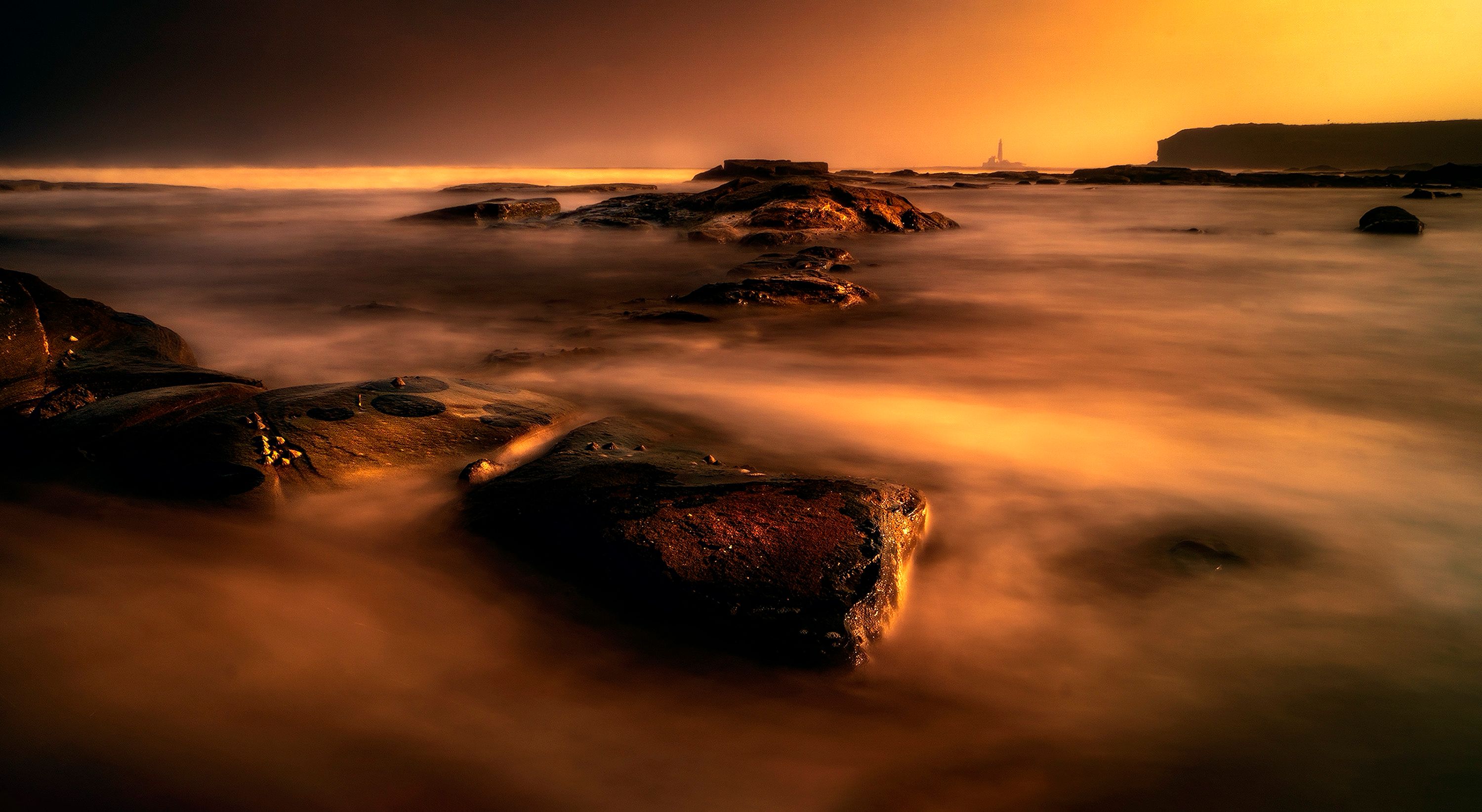 Brown Rocks in Water During Sunset · Free Stock Photo