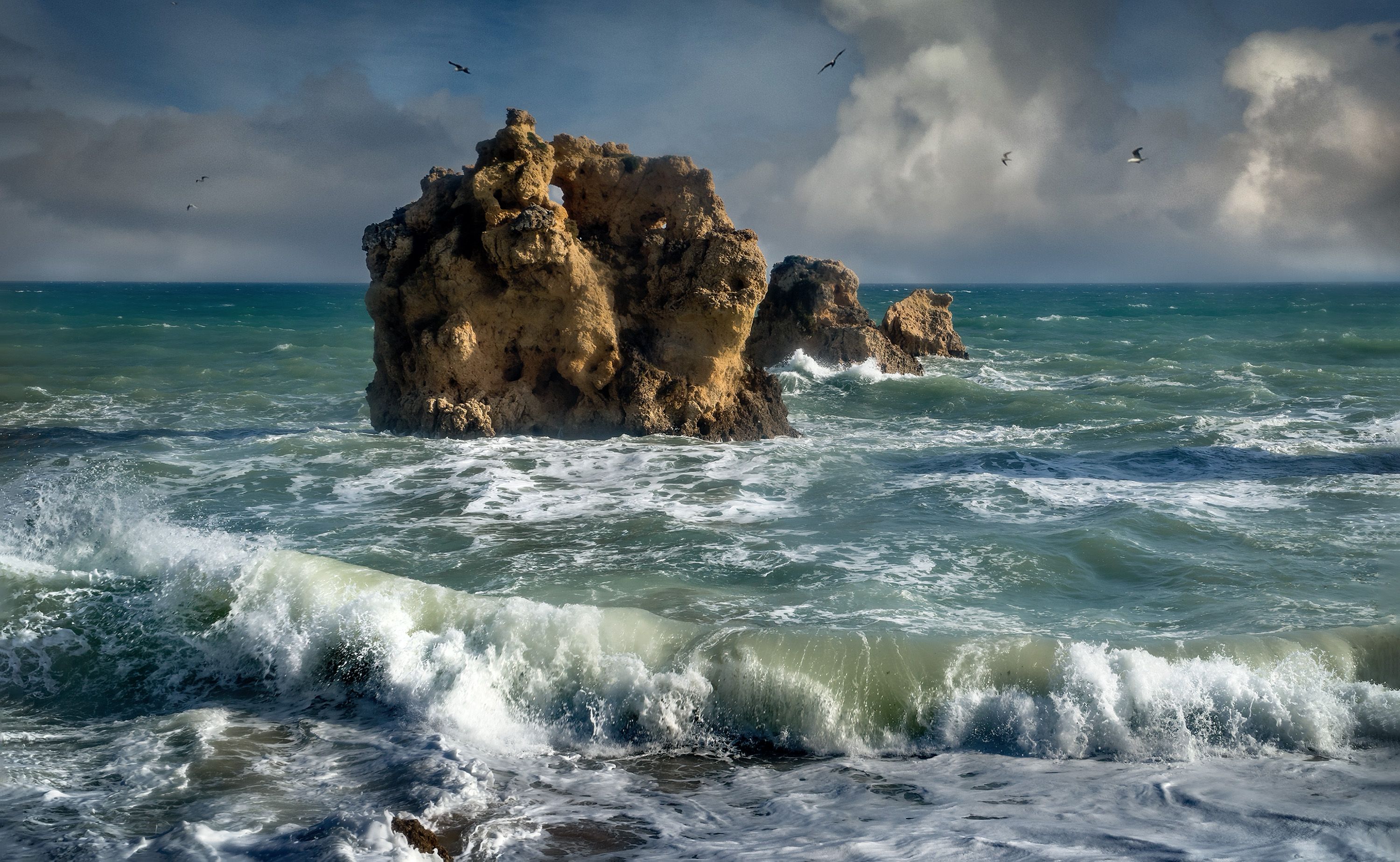 Brown Rock Formation on Sea Water · Free Stock Photo