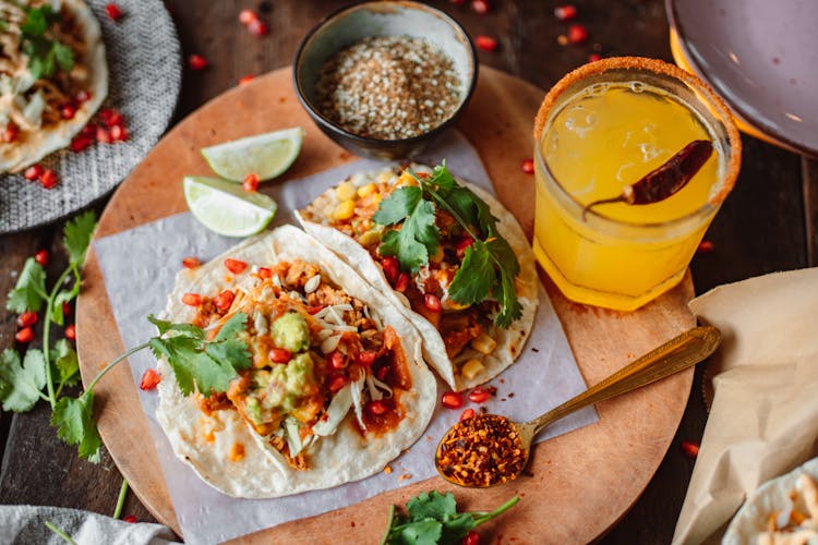 Tacos On A Cutting Board, Juice In Glass And Spices 