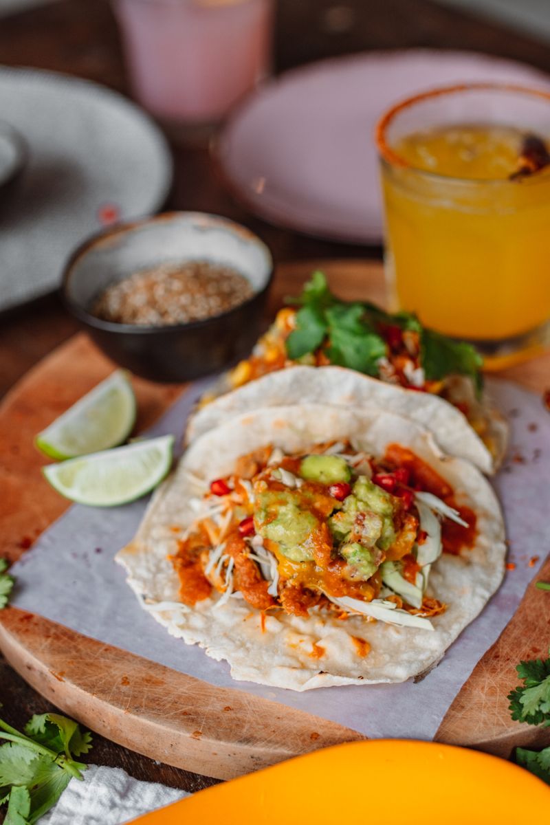 Tacos with salsa and guacamole toppings