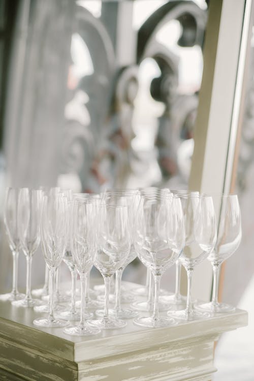 Elegant crystal glasses placed on table during wedding celebration