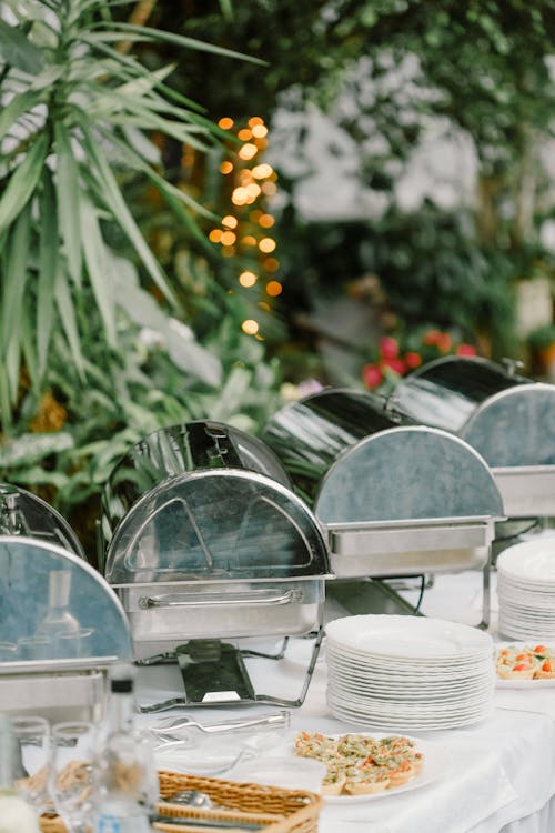 Banquet table with dishware and food