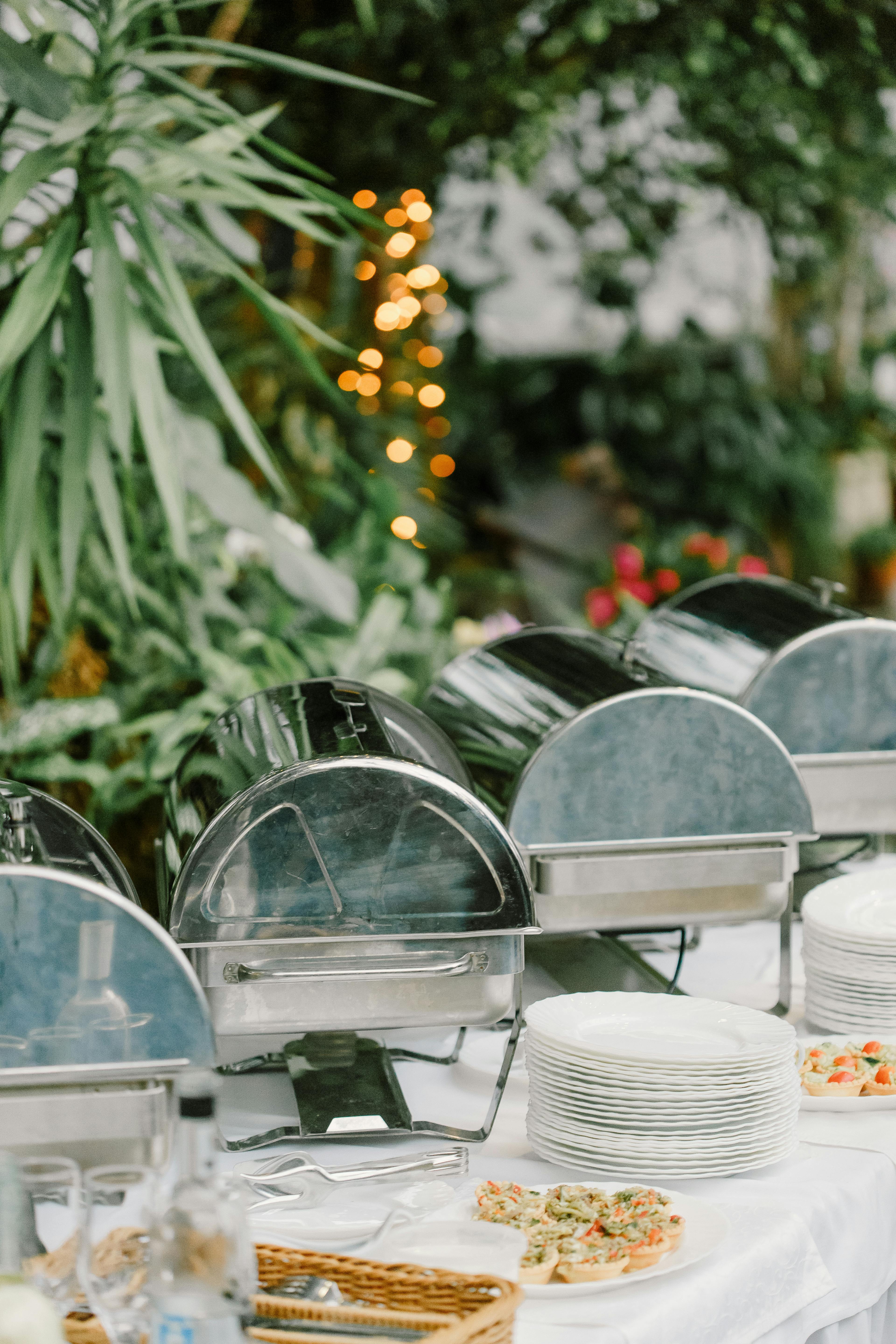 Banquet table with dishware and food