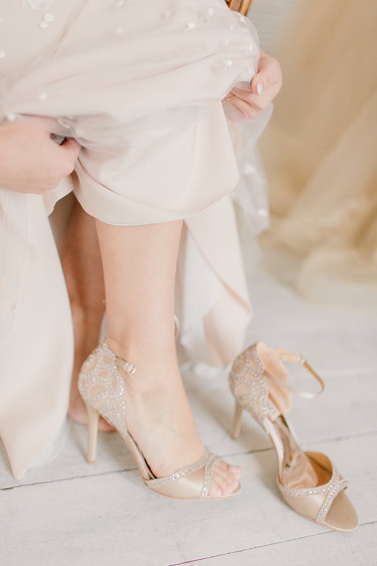 Elegant Bride In Wedding Dress And Shoes