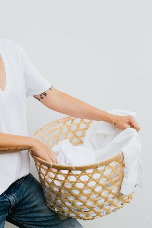 Free A Person Holding a Basket Stock Photo