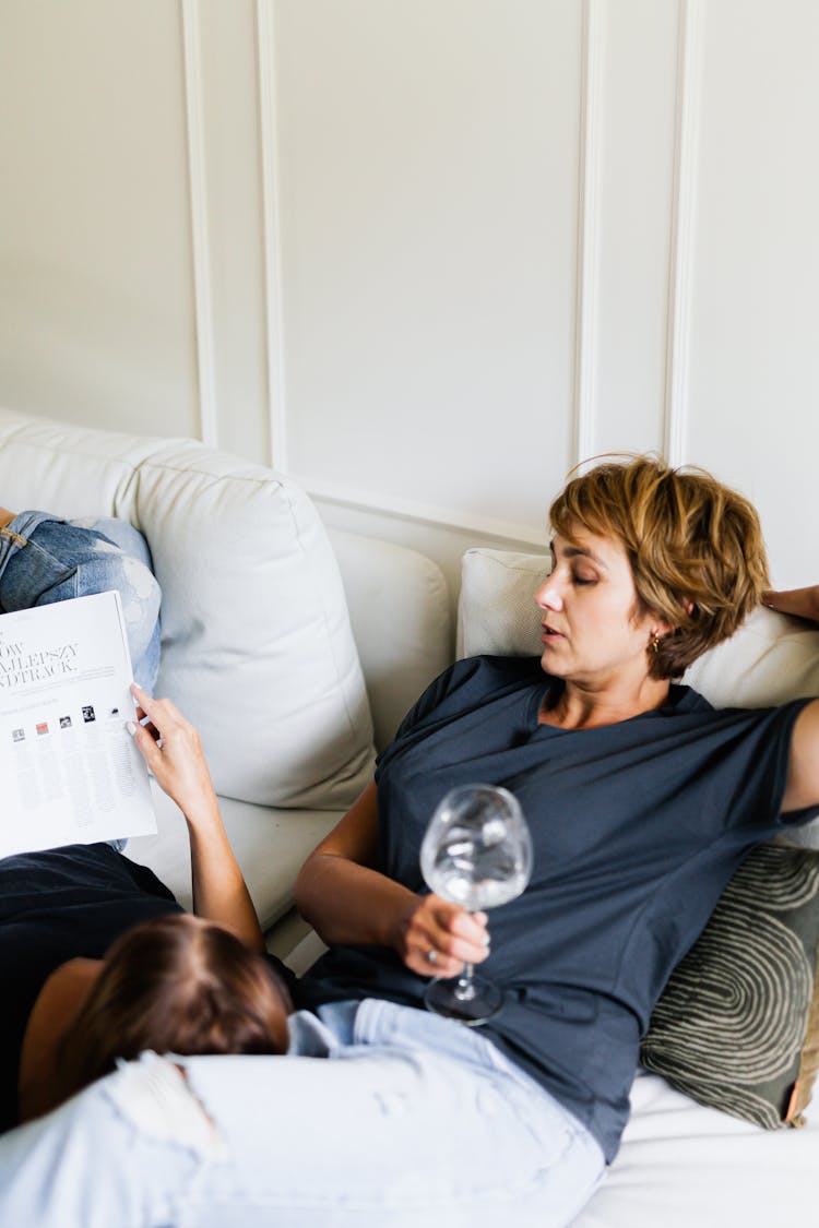 Women On A Couch Relaxing