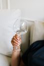 Person Holding Clear Wine Glass