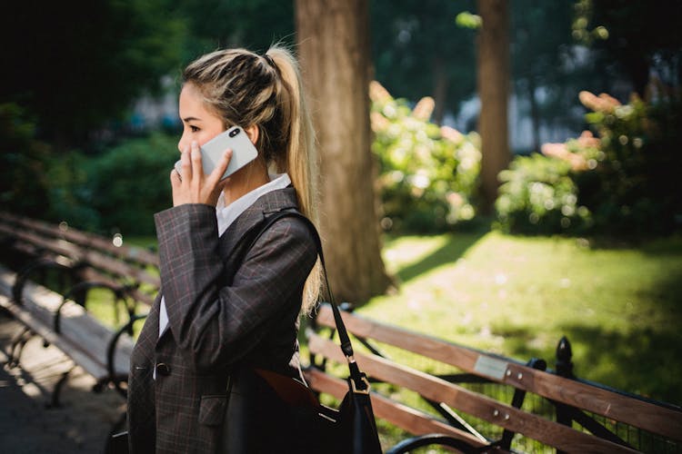 Businesswoman Talking On Smartphone