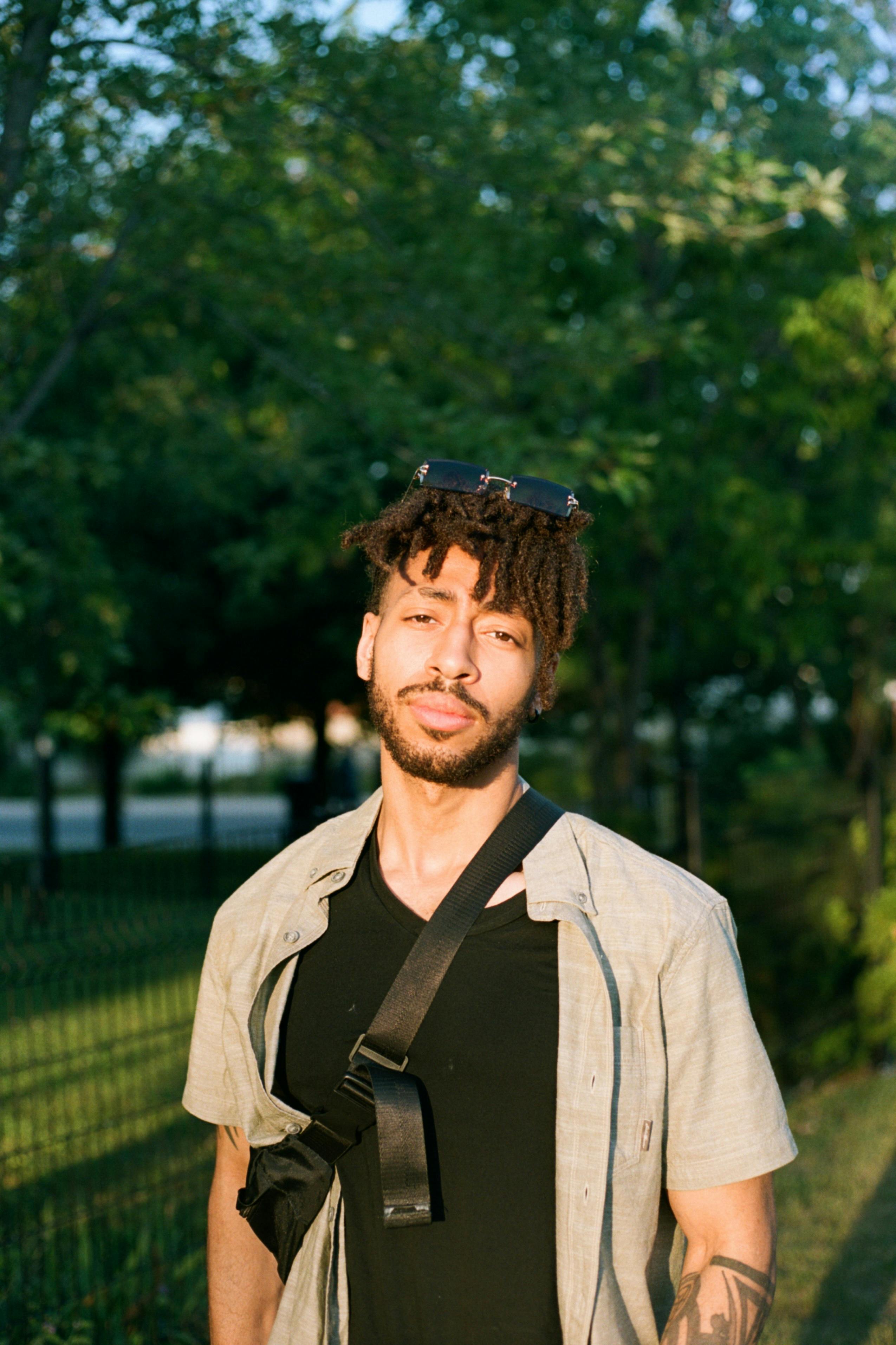 portrait of a bearded man with dreadlocks