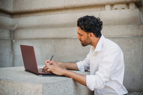 Man Working on Laptop