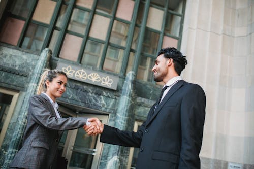 Man and Woman Shaking Hands