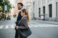 Business People Walking Together on City Street