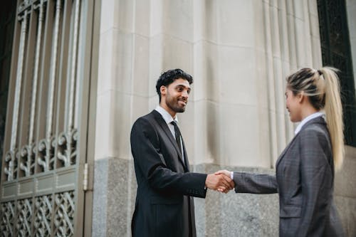 Free Business People Meeting Outdoors Shaking Hands Stock Photo