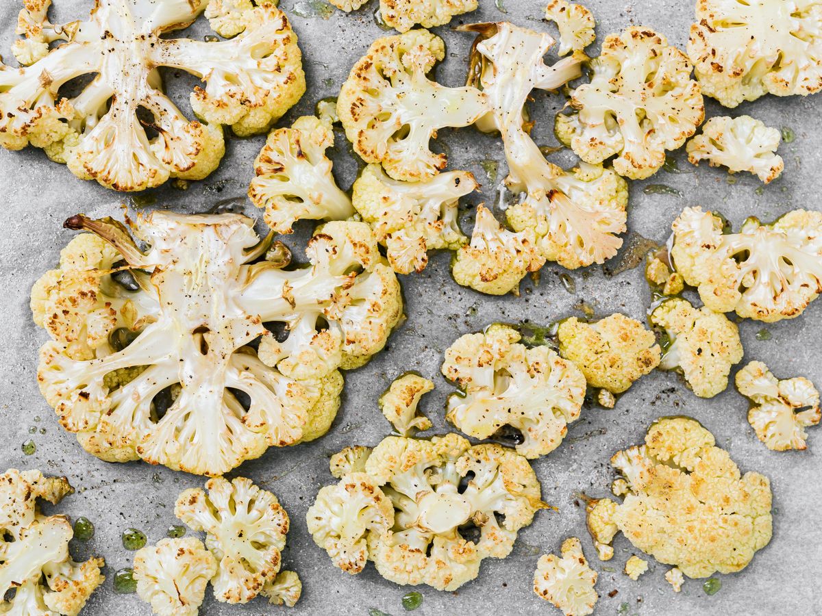 Tray of roasted cauliflower fresh from the oven, an example of a vegetable component for a batch cooking session