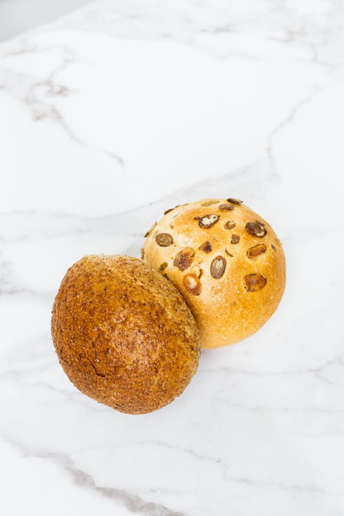 Free Close-Up Photo of Two Baked Buns Stock Photo