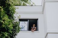 Man and Woman Kissing on Window