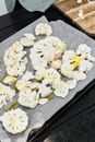 White Flowers on Black Wooden Table