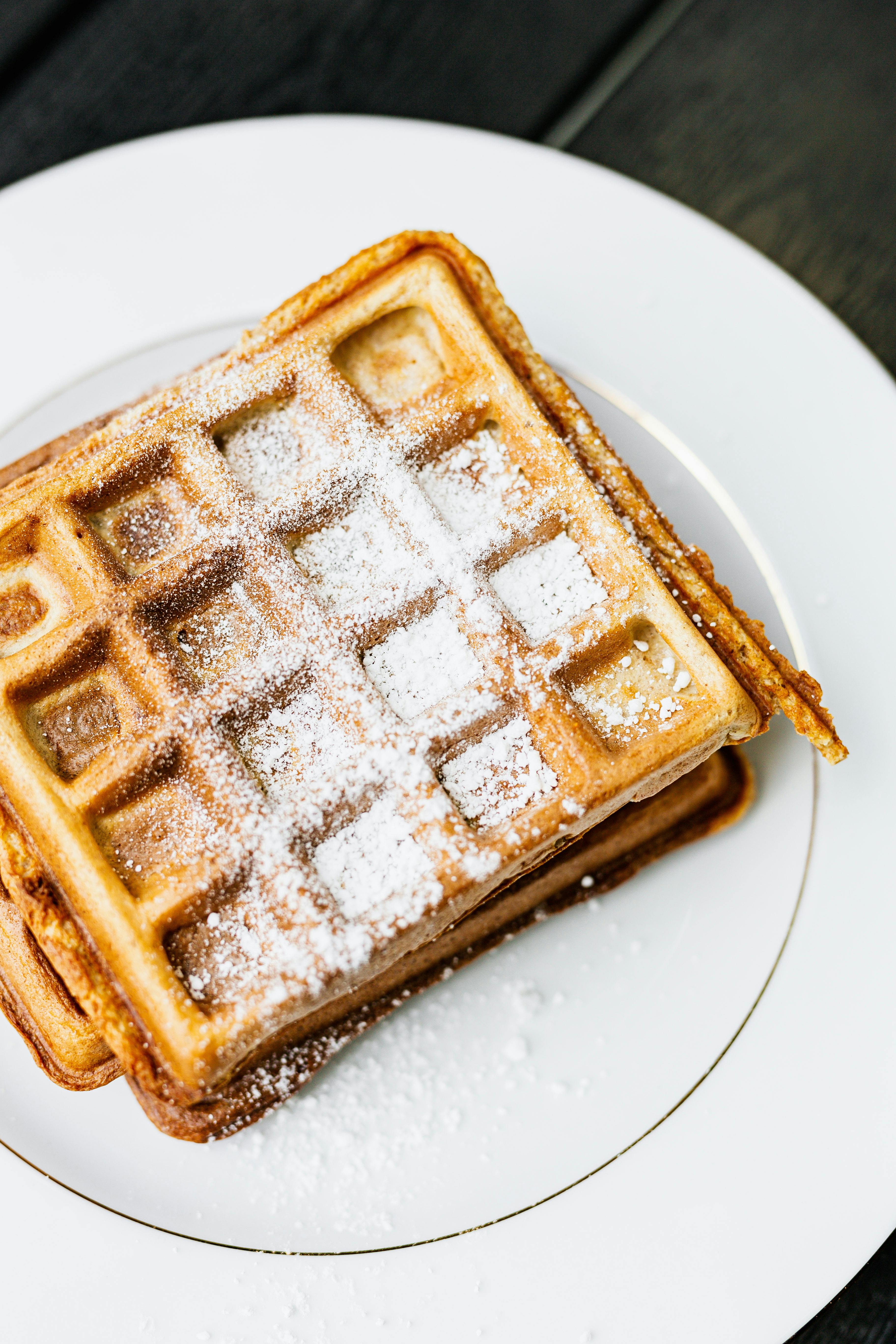 waffle with sugar powder on plate