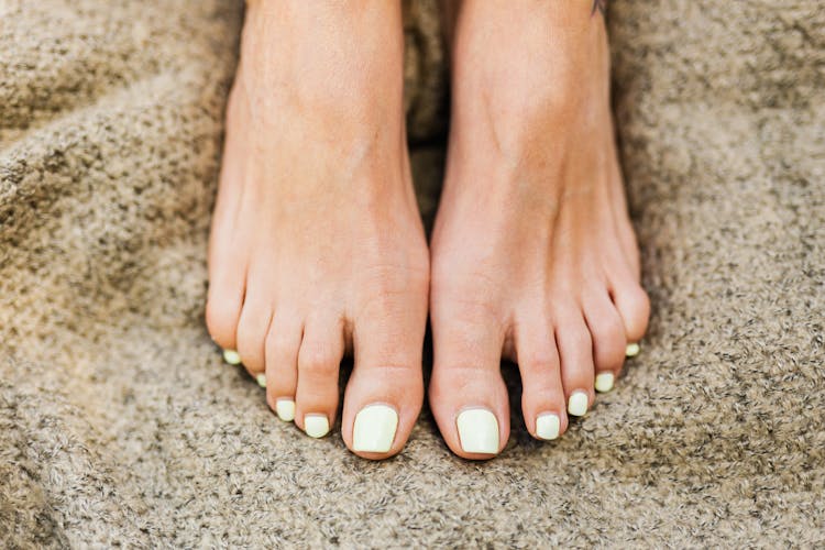 Woman With Painted Toe Nails 