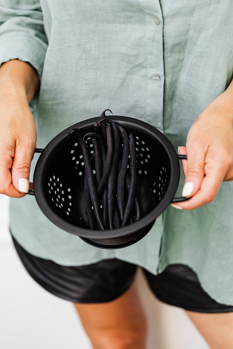 Person Holding Black Beans