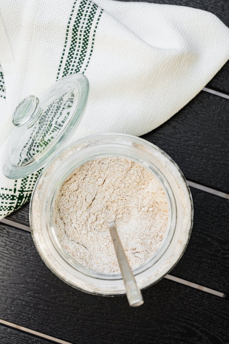 Flour In A Bowl And A Kitchen Cloth