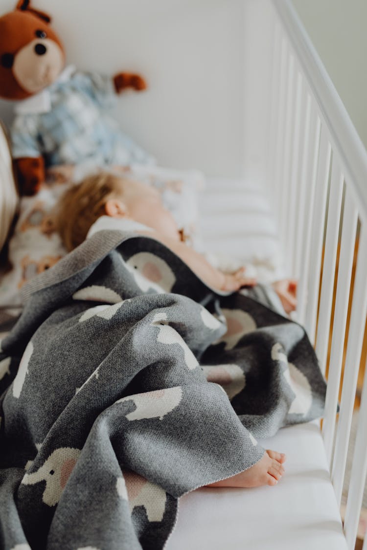 Baby Sleeping Under Blanket 