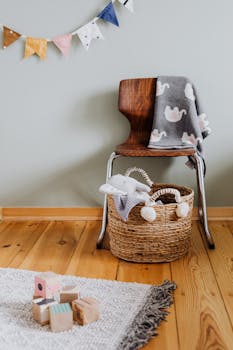 Warm and inviting baby nursery featuring wooden decor and soft toys.