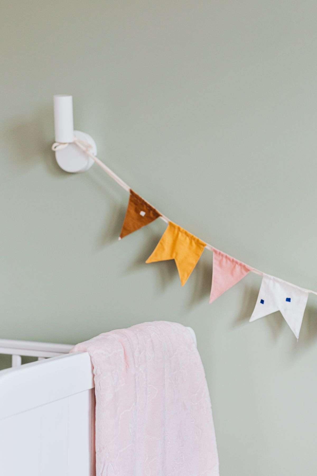 Neutral nursery room with soft colors and simple decor