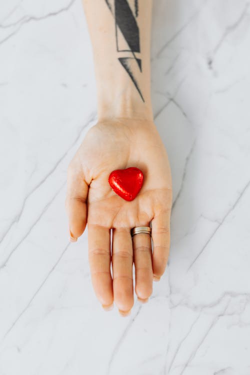 Free Hand with Red Heart Stock Photo