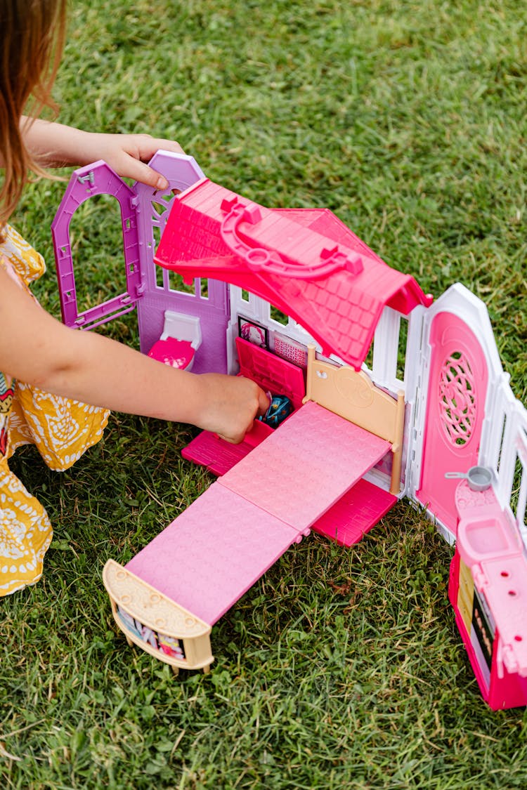 Girl Playing Mini Bedroom Toy