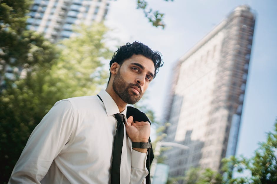 Single founder looking confidently towards a city skyline, symbolizing a startup's growth and success - app development for startups with garage2global Single founder looking confidently towards a city skyline, symbolizing a startup's growth and success - app development for startups with garage2global