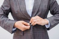 Man in Brown and Gray Plaid Suit Jacket