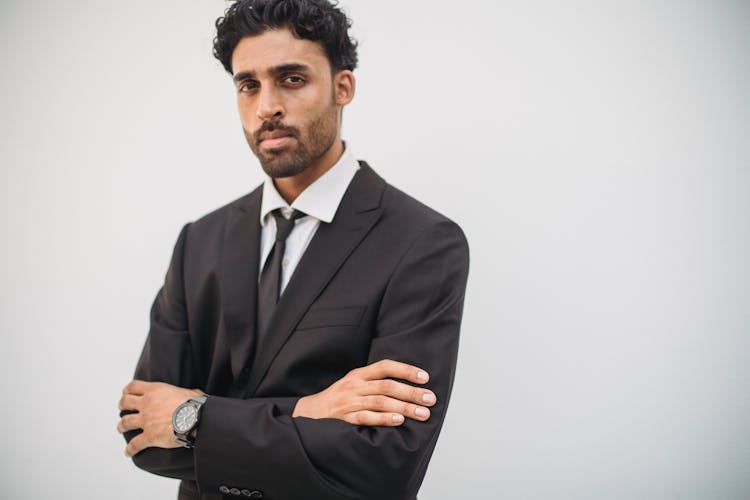 
A Portrait Of A Bearded Man In A Suit