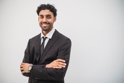 Man Wearing His Black Suit on White Background