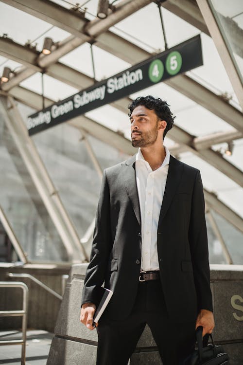 Shallow Focus of a Man Wearing His Black Suit