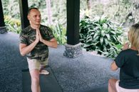 Man and Woman Practicing Yoga