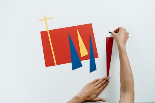 Person Holding Red and White Flag