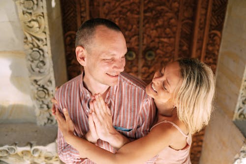 Free Woman Hugging Praying Man Stock Photo