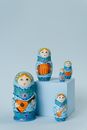 Three Snowman Ceramic Figurines on White Surface
