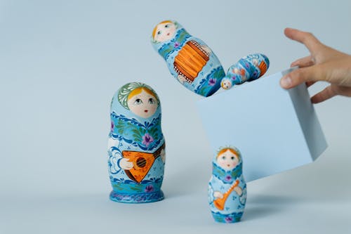 Free Two White and Blue Ceramic Figurines Stock Photo