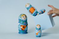 Two White and Blue Ceramic Figurines
