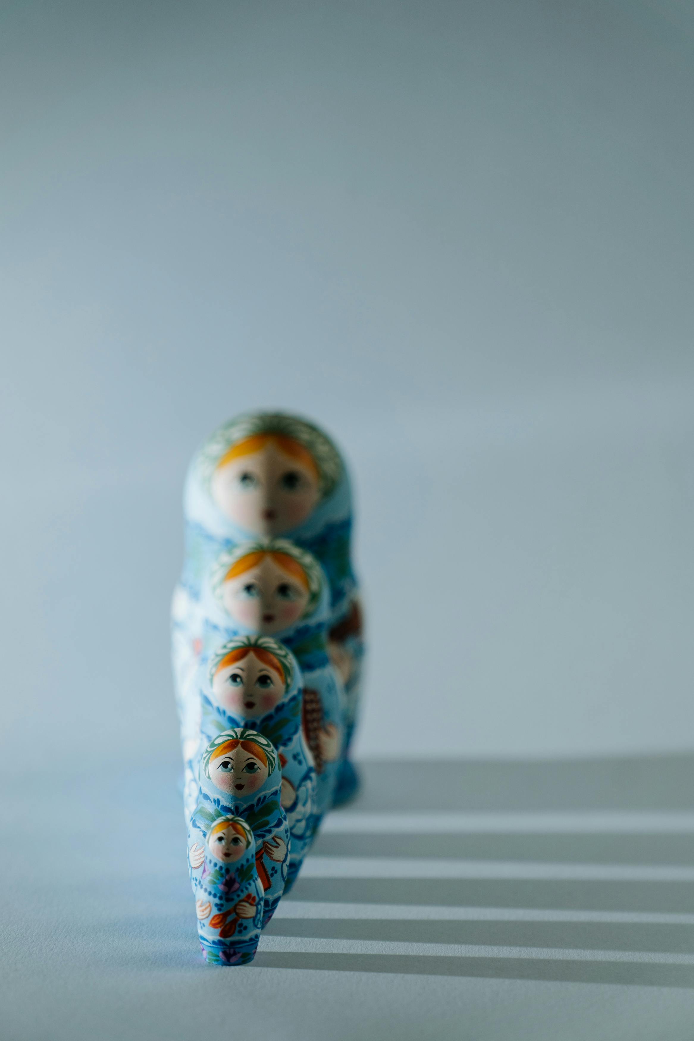 white and blue ceramic owl figurine