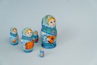 Two Yellow and Red Ceramic Owl Figurines