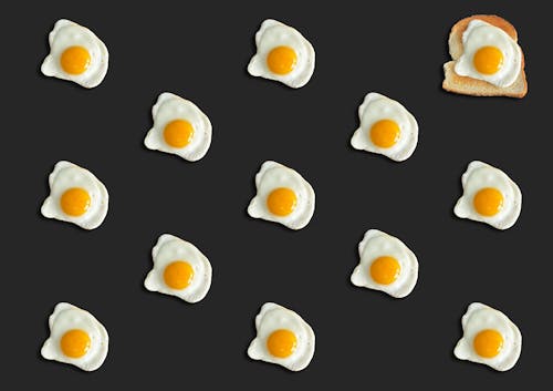 Cooked Eggs on Black Background